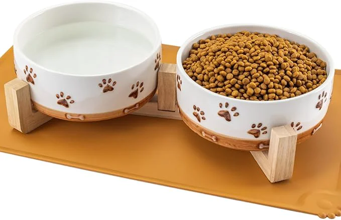 Original Ceramic Dog Bowls 3.5 Cups Dog Food and Water Bowl Set for Medium Dogs with Wooden Stand and Non-Slip Silicone Food Mat Weighted Embossed Cute Puppy Bowls Feeding Dishes Set of 2 32 OZAbout ThisOverview Dependable