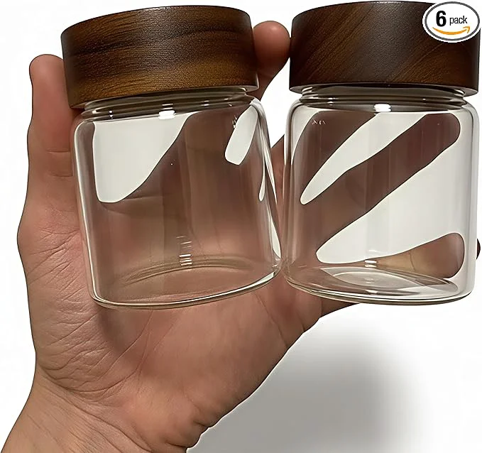 Contemporary Wide Mouth Glass Storage Jars With 2.5 Acacia Wood Lids – 6 Pack of 6 Oz Food Storage Containers – Borosilicate Glass Canisters Sets For Kitchen – Pantry Organizers and Storage for Flour Rice CoffeeAbout ThisOverview Environmentally Friendly