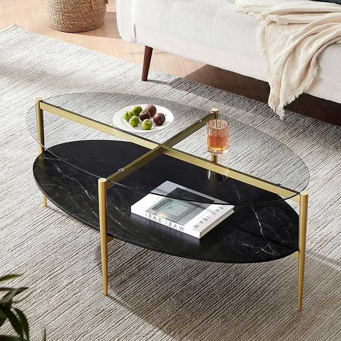 Sophisticated Oval Glass Coffee Table Mid-Century Modern Design L43 x W22 x H17 inch Surfboard Shaped Grey Glass Top and Black Marble Finish Wood Shelf Tapered Legs with Gold Finish FrameAbout ThisOverview Powerful