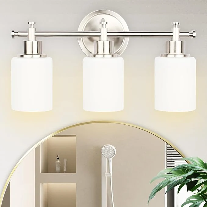 Relaxed 3-Light Bathroom Vanity Light Fixtures Brushed Nickel Compact Wall Sconce with White Glass Shade for Mirror Bathroom Living Room Modern Style E26 Base 15.75 InchAbout ThisOverview Refined